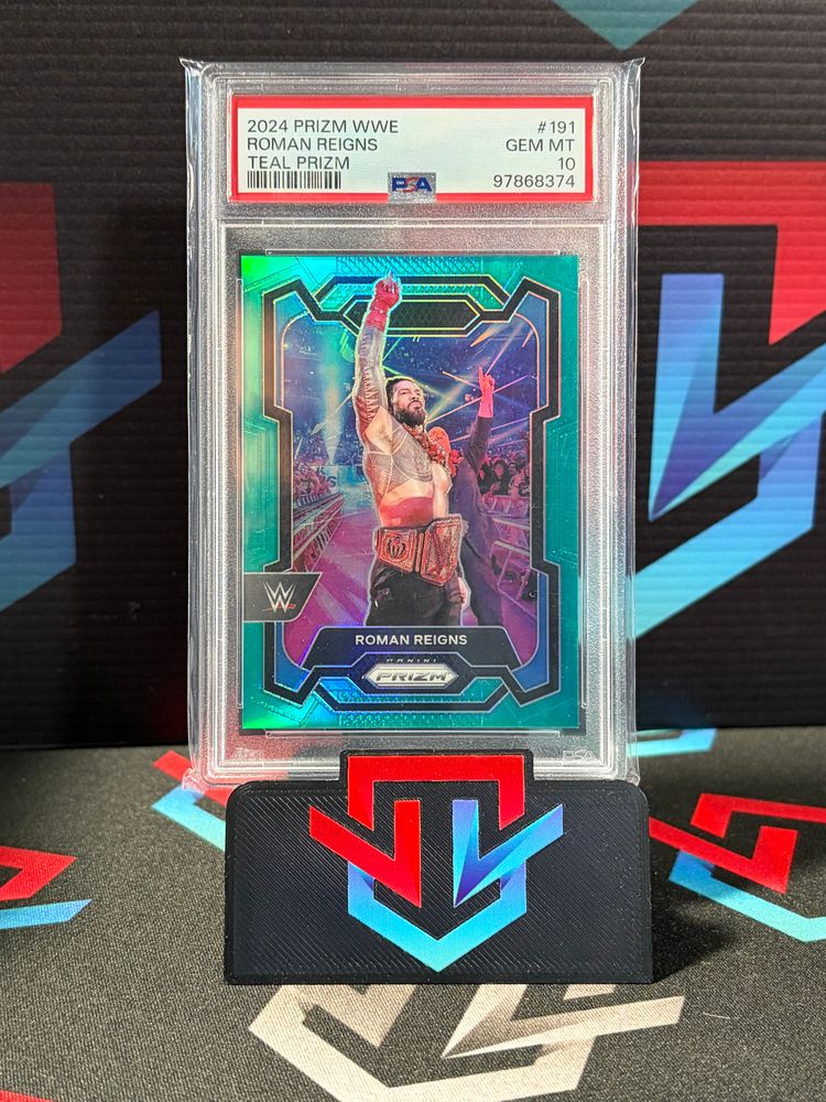 Immagine di Roman Reigns Teal Prizm /49 PSA 10 GEM MINT 1
